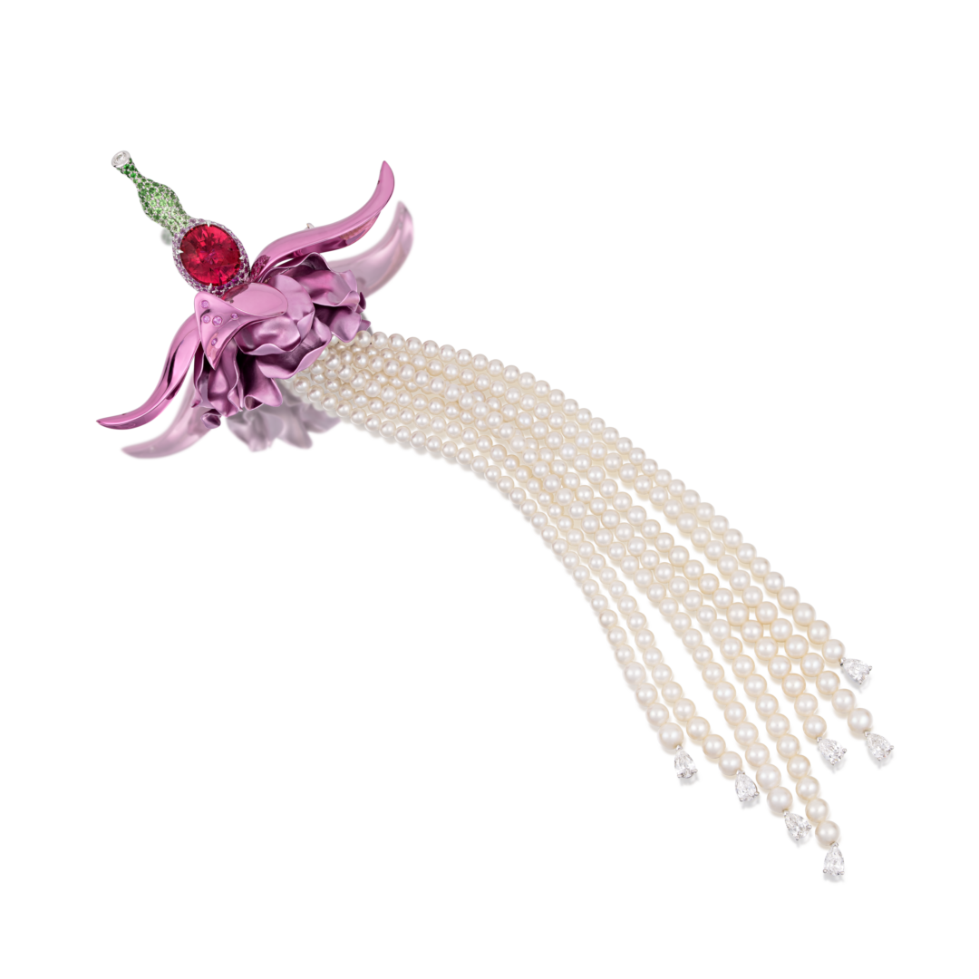 Woman with sunglasses walking down runway